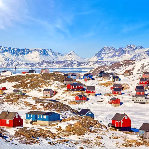 View of Kulusuk village with traditional wooden houses